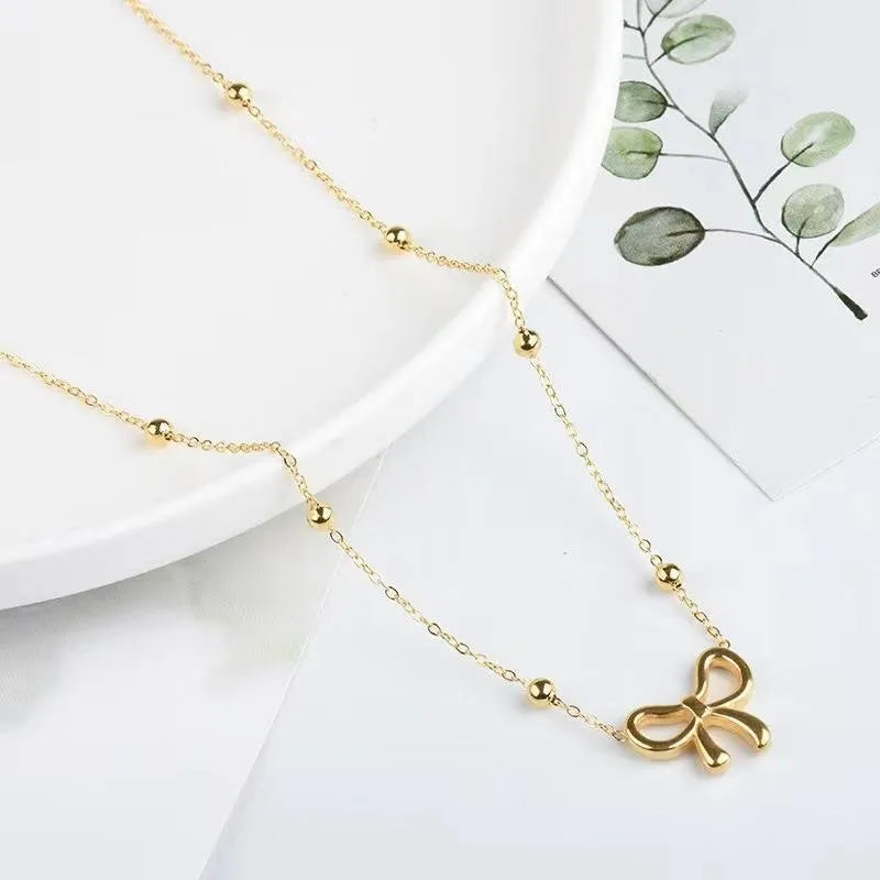 Orexy™ Beads Golden Grace Bow Necklace
